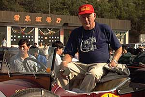 Lord Edward Montagu of Beaulieu on his ill-fated car, 
moments before the race begins